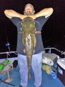 Flatheads are Arwood’s favorites. He is shown here with a 46-pound beast. 