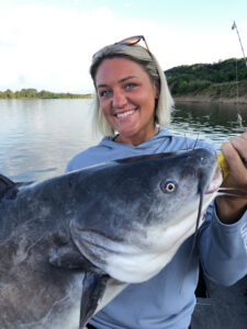 Brittany Sapp is all bright eyes and big smiles showing off a trophy Tennessee River blue cat. (Photo: Richard Simms)
