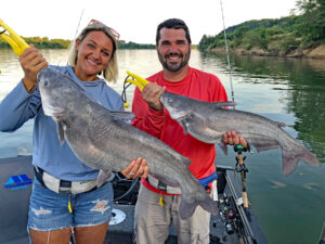 Brittany Sapp wasn’t interested in fishing until she went one time in an apparent effort to humor her then-boyfriend, Bryan Sapp. That’s when Brittany got hooked. Here Brittany and Bryan doubled up on a pair of nice blues fishing the Tennessee River near downtown Chattanooga. (Photo: Richard Simms)