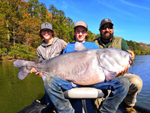 The trio fished hard for a full day, catching a total of eleven catfish. But besides the two catfish weighing in at more than 100-pounds each, Woody Cabe caught this massive blue catfish weighing 55 lbs. Capt. Ty Konkle says you cannot always catch such monsters, but he believes the deep waters of 26-mile-long Tennesse River Gorge harbors more monster cats than most other sections of the Tennessee River. (Photo: Capt. Ty Konkle)