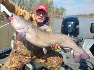 Too cold to fish? Never. Mark Thompson catches big blue catfish in the cold of November and early December. (Submitted photo)