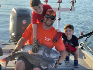Family is a big part of catfishing for Lail. He is shown here on a family outing with his two sons Deacon and Maximus. Family is a big part of catfishing for Lail. He is shown here on a family outing with his two sons Deacon and Maximus. 