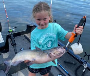 Now that Sadie is 7 years old, the fish have gotten bigger. She is shown here with a nice Lake Springfield channel cat. Just look at the pride in that face. 