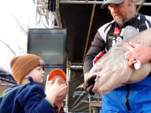 Larry Muse caught this beast on a cold winter day in Alabama. He was happy to share with a young catfish fan at the weigh-in. 