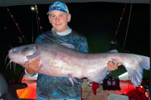 photo of Chandler holding a 51 pound catfish