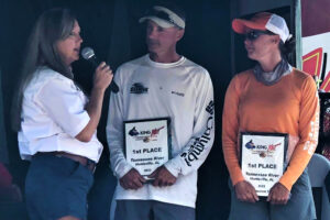 Joe and Demetria are shown here with their first place plaques while being interviewed by KingKat Administrative Assistant Lisa Gail Haraway with KingKat owner Bob Denen looking on. (KatMama Industries Photo) 