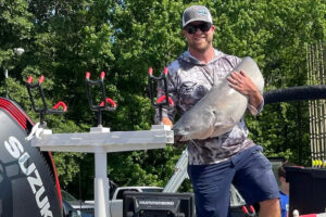 Team Guntersville Bait Company’s bag included Big Kat of the Tournament. Brad Lail is shown here with the 45.86 pound blue that took big fish honors. 