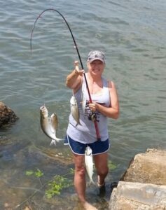 Lisa plays an active role in Bama Skips, including catching the skipjack. Actually, it is an activity she enjoys. 