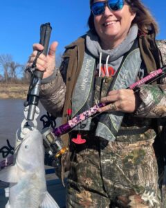 Paula Ward Rounsaville is shown hear with a Lady Elite and a nice Mississippi River blue cat she caught while fishing with B’n’M Prostaffer David Magness. (Cat'n Aroun' Guide Service Photo)