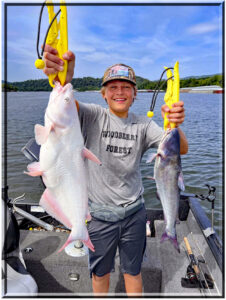 Both of these fish are blue catfish ( Ictalurus furcatus). The one on the right is the typical common coloration. The one on the left, however, is considered leucistic, caused by a rare recessive gene. Even serious anglers can fish their entire lives and never catch one. (Photo: Richard Simms)