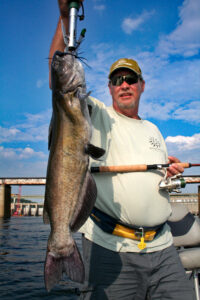 Steve Rushing of Pinson, Tenn. caught the biggest channel catfish ever brought into Capt. Richard Simms’ boat – this 11-pounder. (Daniel Mires Photo)