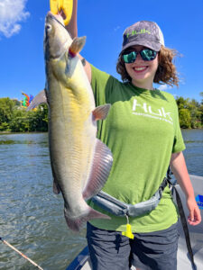 While Tennessee River channel catfish are notably smaller than blue catfish, they fight extremely hard and produce fun fishing action. Megan Powers shows a good quality Tennessee River channel cat. (Richard Simms Photo)
