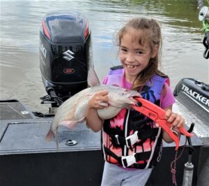 Jay'Lynn Williams loves to fish for crappie and bluegill but her favorite thing to fish for is catfish with her daddy. When she does her happiness is shown by her smile. 