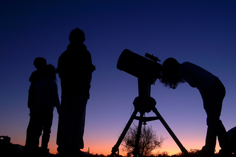 Winter is a great time to spend an evening outdoors with kids gazing at the stars. | Winter activities for kids