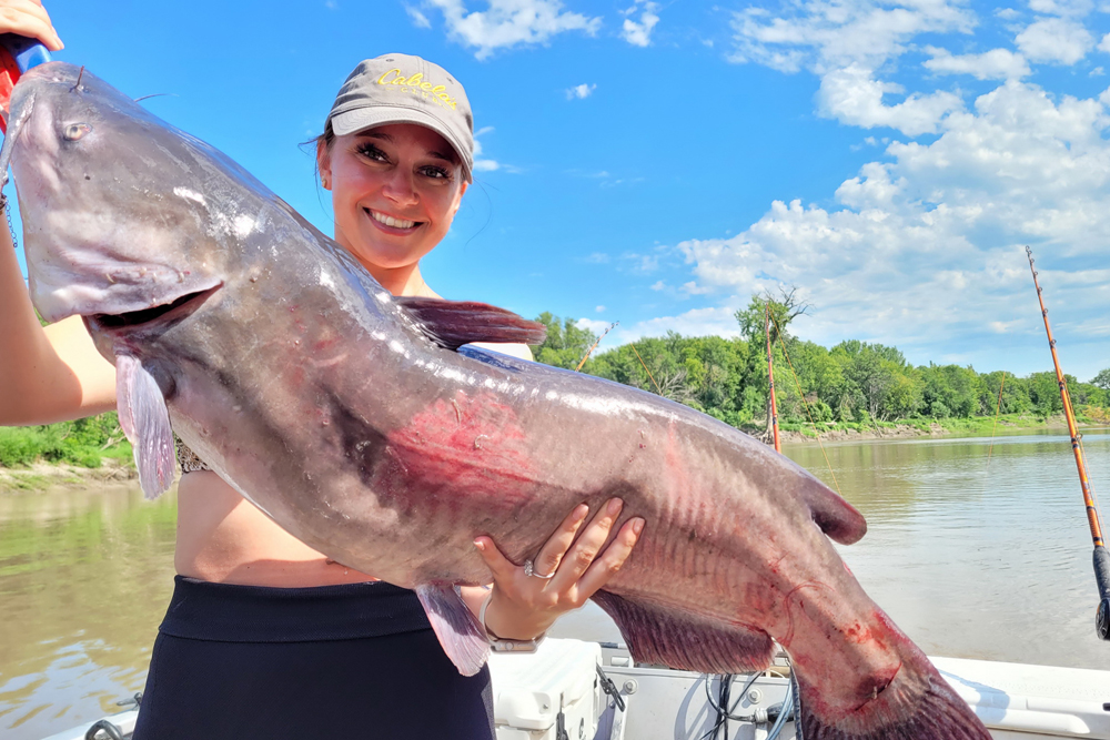 Sarah Zimmerman may be petite, but she’s always ready to tussle with a big catfish.