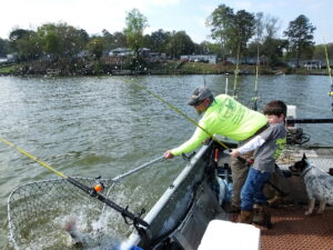 Huge catfish roam skinny water during spring and, by fishing the right targets, anglers can hook some of these tackle-taxing fish.