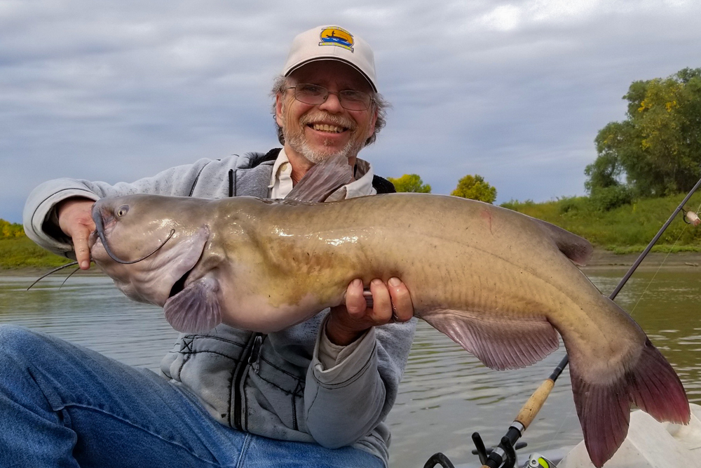 Channel catfish, like this beauty caught by Ted Ellenbecker, differ considerably in their habits from blue cats and flatheads. This creates variety in the sport that helps attract millions of participants.