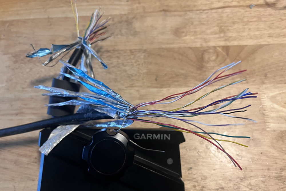 Amazing to see just how many small wires are required to transmit information from this Garmin transducer to the fishfinder.