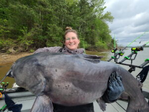 When fishing at home in West Virginia, catfish guide Tabitha Linville goes after flatheads. But she doesn’t mind wrangling a big blue cat like this one caught on Wheeler Lake in Alabama. (Tabitha Linville photo)