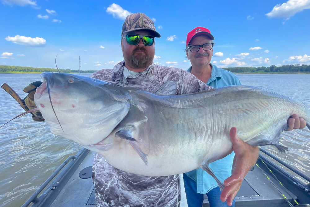 Tennessee River fishing guide Mike Mitchell (left) knows all the tricks necessary to put his clients on trophy-class catfish