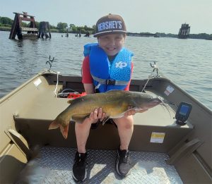 The author’s son, Jake, caught this channel catfish in June. He caught it in a tidal creek, in the slower-moving waters off the main channel, very near the remnants of a pier.