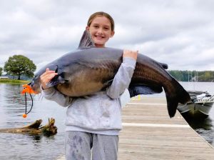 Abby Miller with the Big Fish in a tournament while partnering with her dad.