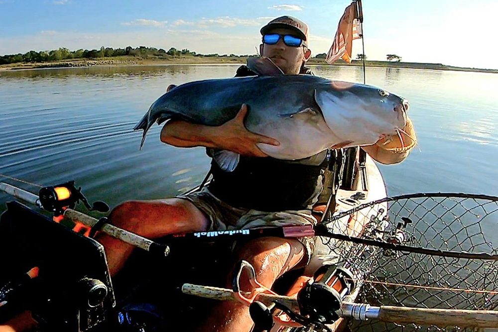 Small Boat Big Catfish By Brent Frazee