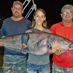 Brooke Mayfield shows off a trophy blue caught fishing one of the many tournaments she fished with her Dad, Chad Mayfield (left), and friend, Jeff Helms (right). (Contributed Photo)