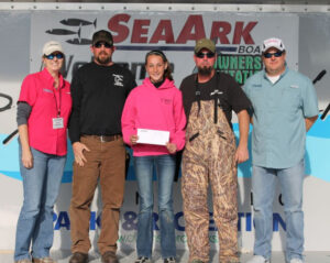 Brooke Mayfield was much younger, and understandably proud the first time she and her Dad collected a check in a SeaArk catfishing tournament on Wheeler Lake, one of her favorite lakes. (Contributed Photo)