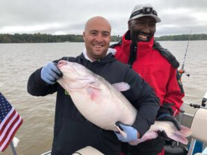 Capt. Big John Garland’s knowledge of fishing tidal waters results in numerous catches of big cats like this for his clients. 