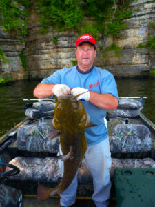 When targeting channels on wood near shallow bluff walls Barton sometimes catches a bonus fish like this nice Pickwick Lake flathead. 