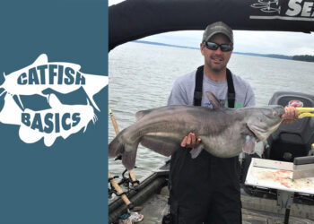 photo of Ty Wolf holding a catfish