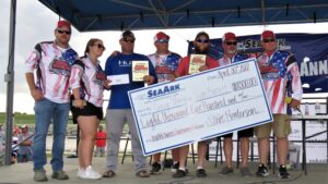 It was all smiles on stage following the tournament when Norris and Burnett were presented the Big Check for $8,500. 