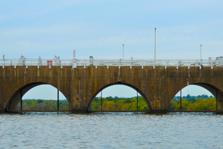 Wilson Lake Dam backs up the smallest lake on the Tennessee River. Water depth varies from nearly 100 feet at the dam to the shallow rapids in trail race at Wheeler Dam some 15 miles away.