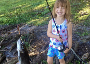 Channel catfish catches bring on plenty of smiles at the MLK Jr Park Pond in Winter Park, FL.