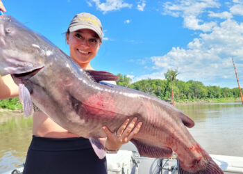 Sarah Zimmerman may be petite, but she’s always ready to tussle with a big catfish.