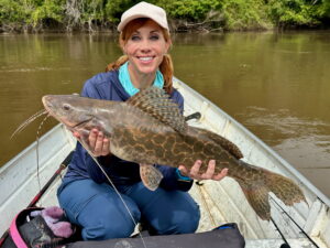 Anietra Hamper with a hard-fighting, beautifully patterned leopard catfish.