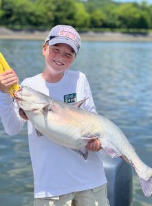 The light-tackle technique is especially easy, proving to be an excellent technique for youngsters. Bo Valentine had great fun battling this big blue on standard spinning tackle in June. (Photo: Capt. Richard Simms)