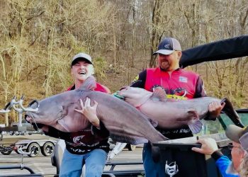 Whether he’s helping guide other anglers or fishing a big catfish tournament with his dad Mike (on right), Jackson Mitchell (left) of Russellville, Alabama always has a big smile on his face that shows how much he loves catfishing. (courtesy of Jackson Mitchell)