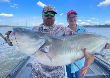 Tennessee River fishing guide Mike Mitchell (left) knows all the tricks necessary to put his clients on trophy-class catfish