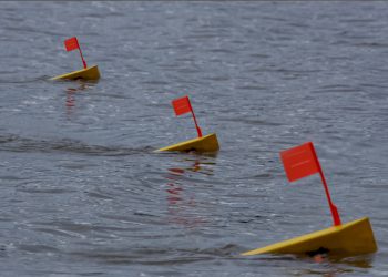 More and more catfish anglers are employing planer boards like those from Off Shore Tackle to improve their fishing success.