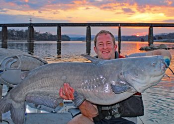 Capt. Sam Simons shows off a monster blue