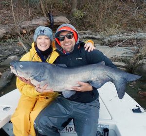 Roberta Arostegui and her son Martini pose with Roberta’s 37-1/2-pound Potomac River blue cat, a new IGFA Women’s 12-pound Line Class World Record.