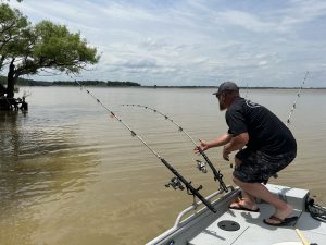 An angler on Grenada Lake gets a big bite. 