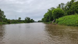 This is looking at a river downstream. Near the bank to the right, you can see flat water. This is a current break. Normally this break is the shore to the river, but during high water, it creates a secondary (OFF) current seam.