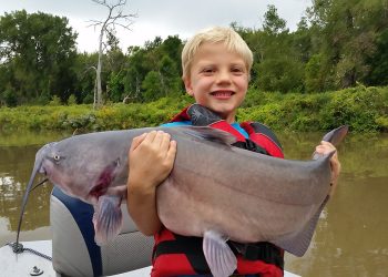 Braden Durick, the author’s son, in 2016 when he was six years old. This was the day Braden discovered that catfishing is amazing.