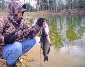 Fish a farm pond in winter? For catfish? Some might think it futile, but Alex Hinson of Paron, Arkansas shows the result of a few minutes fishing on a cold winter day.