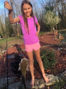 Jaylynn Parker starting her catfishing journey early, fishing alongside her dad.