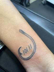 Jaylynn Parker’s tattoo commemorating the weight of her Ohio state-record blue catfish catch.