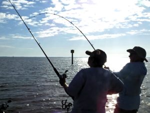 Capt. Witherell emphasizes teamwork. She enjoys helping a client fight the biggest fish of his life; and catching it.